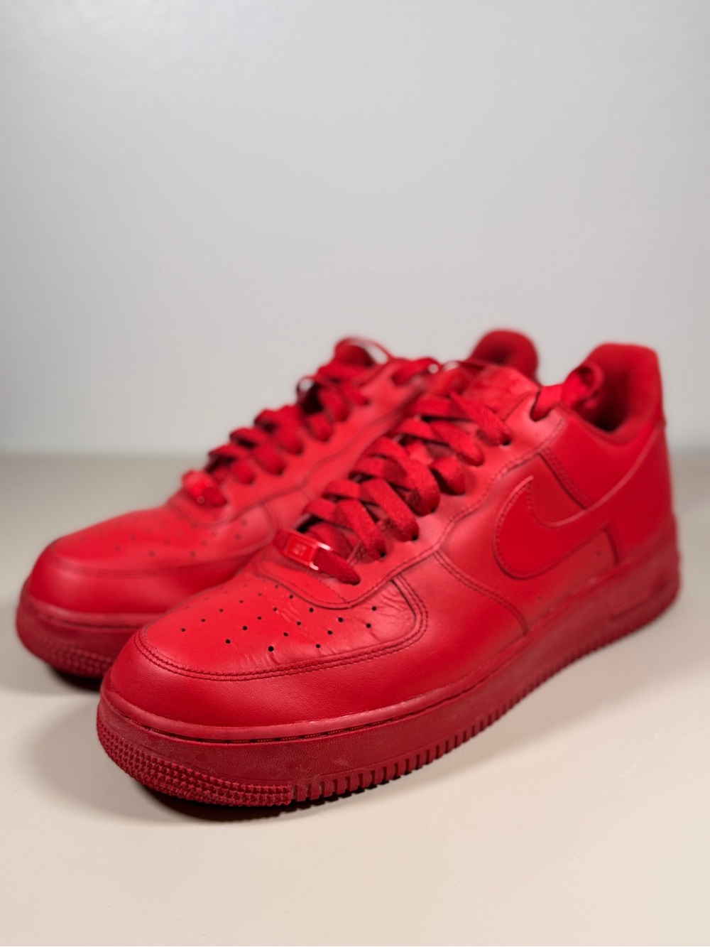 Nike Air Force 1 Men’s Red Low-Top Leather Sneakers